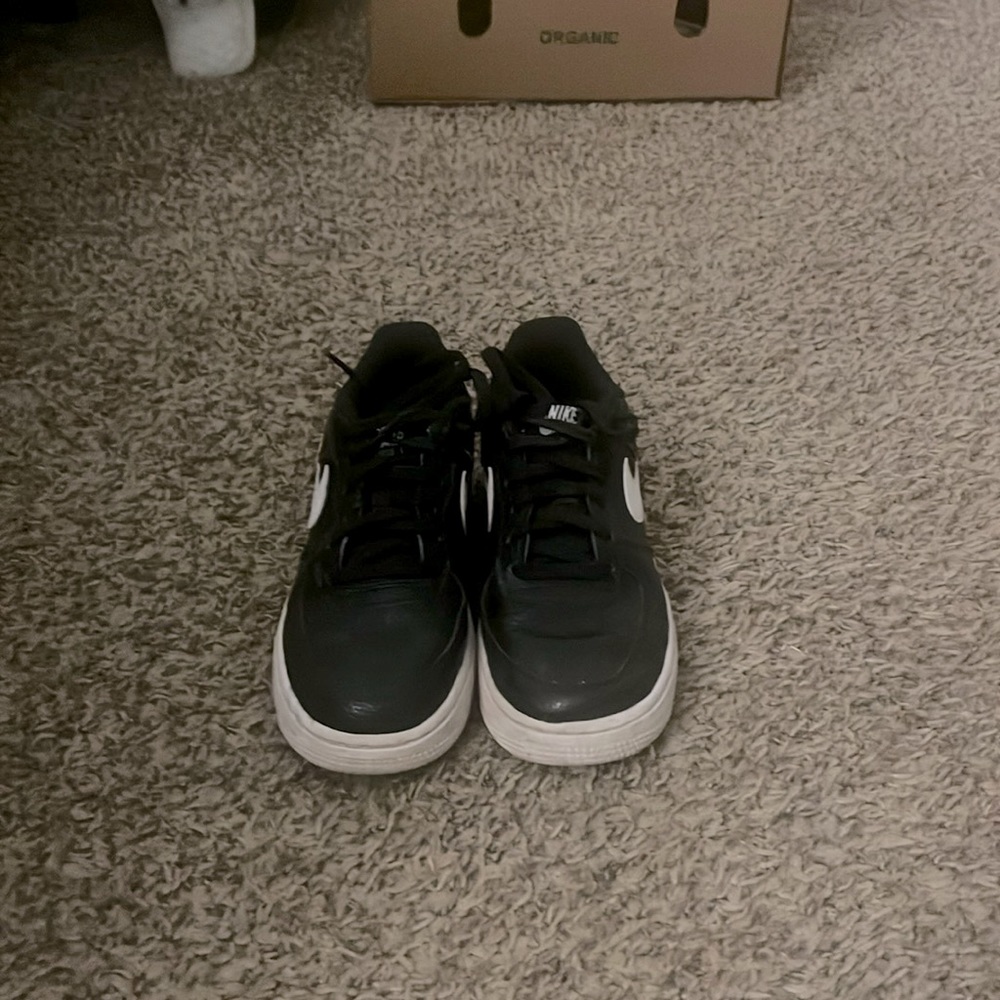 Black and white Nike Air Force 1’s